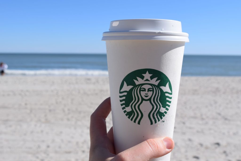 Starbucks on the Beach in Hand