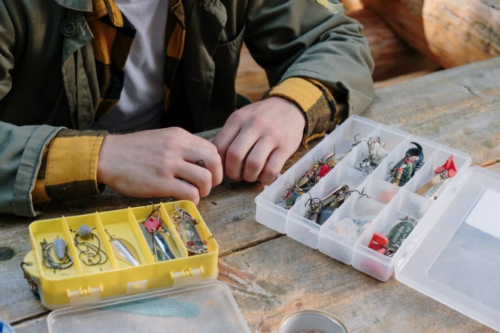 Man with Fishing Boxes