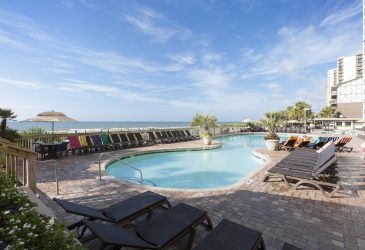 Caribbean Outdoor Pool With Pavers