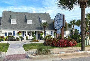 Front entrance and sign of Sea Captains House restaurant